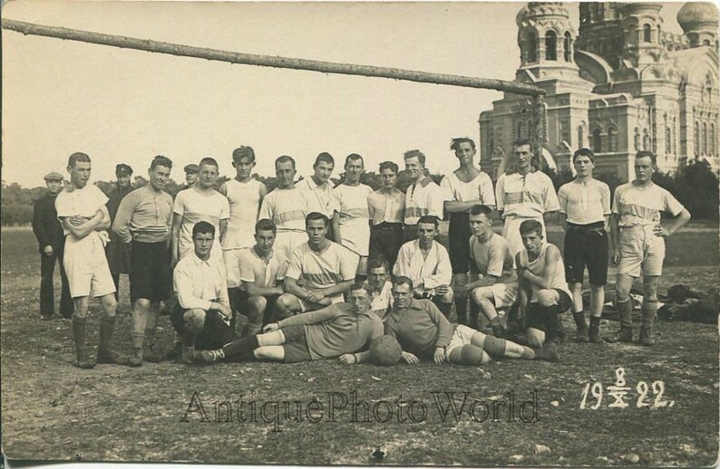 Young men soccer team by Orthodox church antique photo Riga Latvia