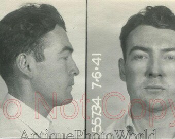 Handsome man criminal antique police mug shot photo