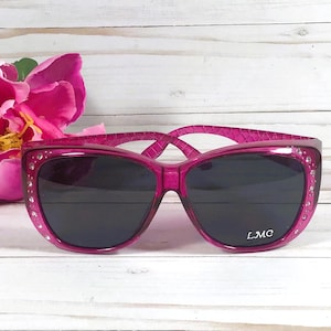 FIT OVER Sunglasses with Rhinestones. Name on lens or arm. Comfortably fits over regular sunglasses. Free Microfiber Pouch with Name.