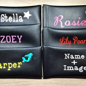 May include: Five black zippered pouches with different names and images printed on them. The names are Stella, Zoey, Rosie, Lily Pearl, and Harper. The images are a star, a flower, a flower, a mermaid, and a plus sign.