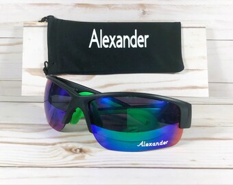 Name engraved Free on sunglass. Exciting New X-Force Sunglass. Great colors. Unisex sunglass. Free Pouch personalized with a Name. 12+.