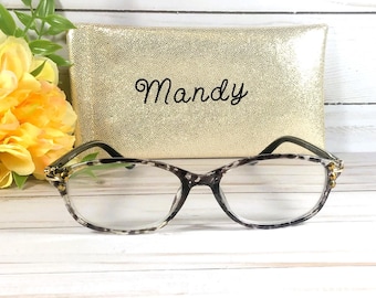 Womens Reading glasses. Gold Accents on arms. +1.25.