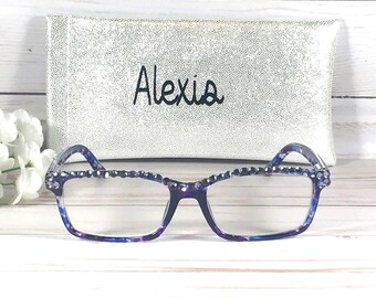 Genuine Purple Swarovski Crystals embellish this reader. Personalize the case with Name. +1.25