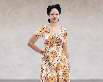 short-sleeved dress with circular skirt and v-neck