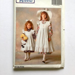 Butterick 5077 Holly Hobbie Girls’ Dress and Pinafore Pattern with Matching Doll Dress and Pinafore, Size 2-6 Vintage Uncut
