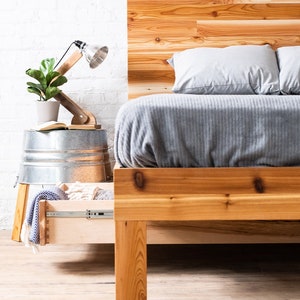 Natural solid wood platform bed frame with storage drawers. Modern, rustic design. Made in the USA. Sustainably sourced materials. Heirloom quality furniture. Bedroom. Home Storage. Headboard.