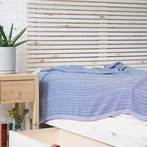 Natural solid wood platform bed frame with storage drawers. Modern, rustic design. Made in the USA. Sustainably sourced materials. Heirloom quality furniture. Bedroom. Headboard. Home storage.