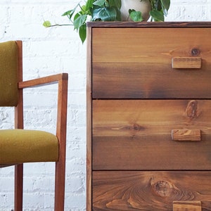 Natural solid wood dresser or storage chest. Furniture for home storage. Chevron pattern detailing. Solid wood drawers. Handcrafted in the USA. Heirloom quality. Sustainably sourced. Bedroom.