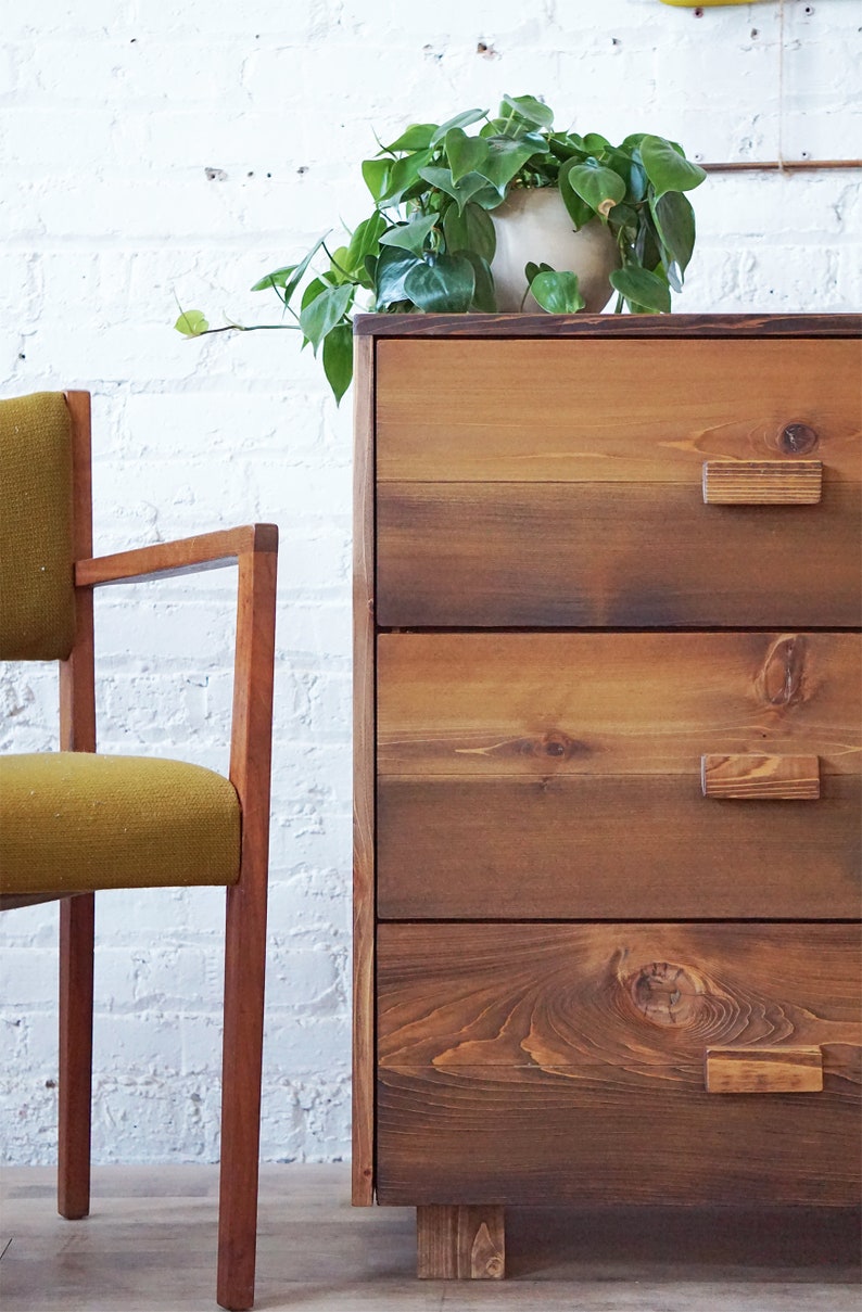 Natural solid wood dresser or storage chest. Furniture for home storage. Chevron pattern detailing. Solid wood drawers. Handcrafted in the USA. Heirloom quality. Sustainably sourced. Bedroom.