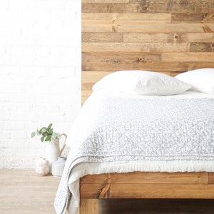 Platform bed frame and headboard set. Made of natural solid wood. Handcrafted in the USA. Heirloom quality furniture. Sustainably sourced materials. Farmhouse. Cottage. Barn wood style.