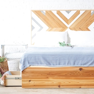 Storage bed. Platform bed frame. Natural solid wood headboard or bed board. Unique and eclectic design. Handcrafted in the USA. Heirloom quality furniture. Sustainably sourced materials. Bedroom furniture. Drawers.