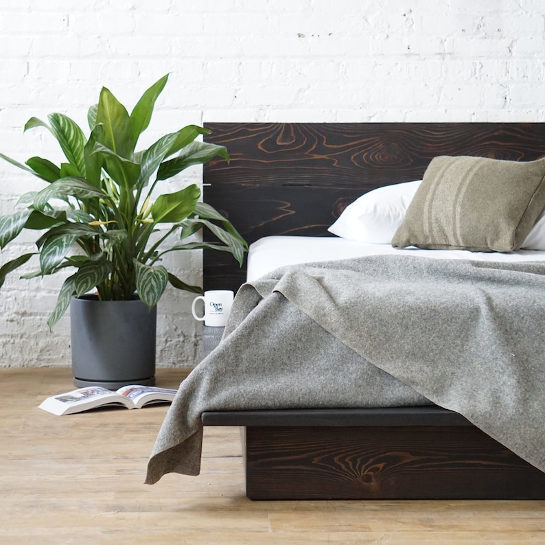 Natural solid wood platform bed frame. Modern, rustic design. Made in the USA.