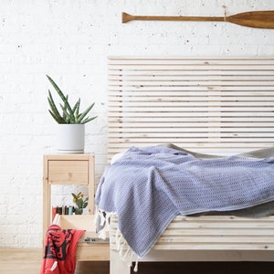 Natural solid wood platform bed frame with storage drawers. Modern, rustic design. Made in the USA. Sustainably sourced materials. Heirloom quality furniture. Bedroom. Headboard. Home storage.