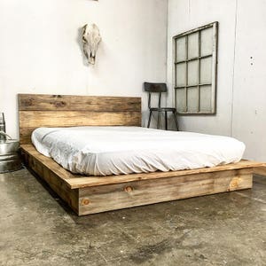 Natural solid wood platform bed frame. Modern, rustic design. Made in the USA.