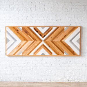 Storage bed. Platform bed frame. Natural solid wood headboard or bed board. Unique and eclectic design. Handcrafted in the USA. Heirloom quality furniture. Sustainably sourced materials. Bedroom furniture. Drawers.