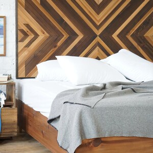 Natural solid wood headboard or bed board with platform bed frame. Unique and eclectic design. Handcrafted in the USA. Heirloom quality furniture. Sustainably sourced materials. Bedroom.