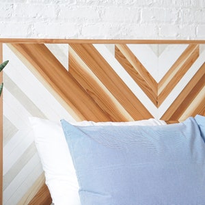 Storage bed. Platform bed frame. Natural solid wood headboard or bed board. Unique and eclectic design. Handcrafted in the USA. Heirloom quality furniture. Sustainably sourced materials. Bedroom furniture. Drawers.