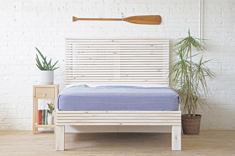 Natural solid wood platform bed frame with storage drawers. Modern, rustic design. Made in the USA. Sustainably sourced materials. Heirloom quality furniture. Bedroom. Headboard. Home storage.