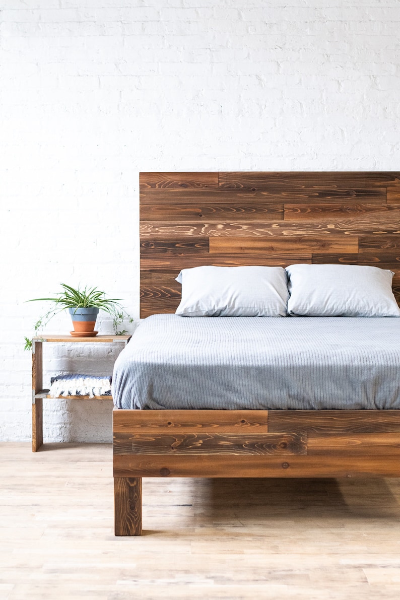 Platform bed frame and headboard set. Made of natural solid wood. Handcrafted in the USA. Heirloom quality furniture. Sustainably sourced materials. Farmhouse. Cottage. Barn wood style.