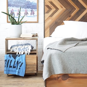 Natural solid wood headboard or bed board with platform bed frame. Unique and eclectic design. Handcrafted in the USA. Heirloom quality furniture. Sustainably sourced materials. Bedroom.