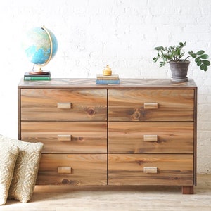 Natural solid wood dresser or storage chest. Furniture for home storage. Chevron pattern detailing. Solid wood drawers. Handcrafted in the USA. Heirloom quality. Sustainably sourced. Bedroom.