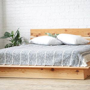 Natural solid wood platform bed frame. Modern, rustic design. Made in the USA.