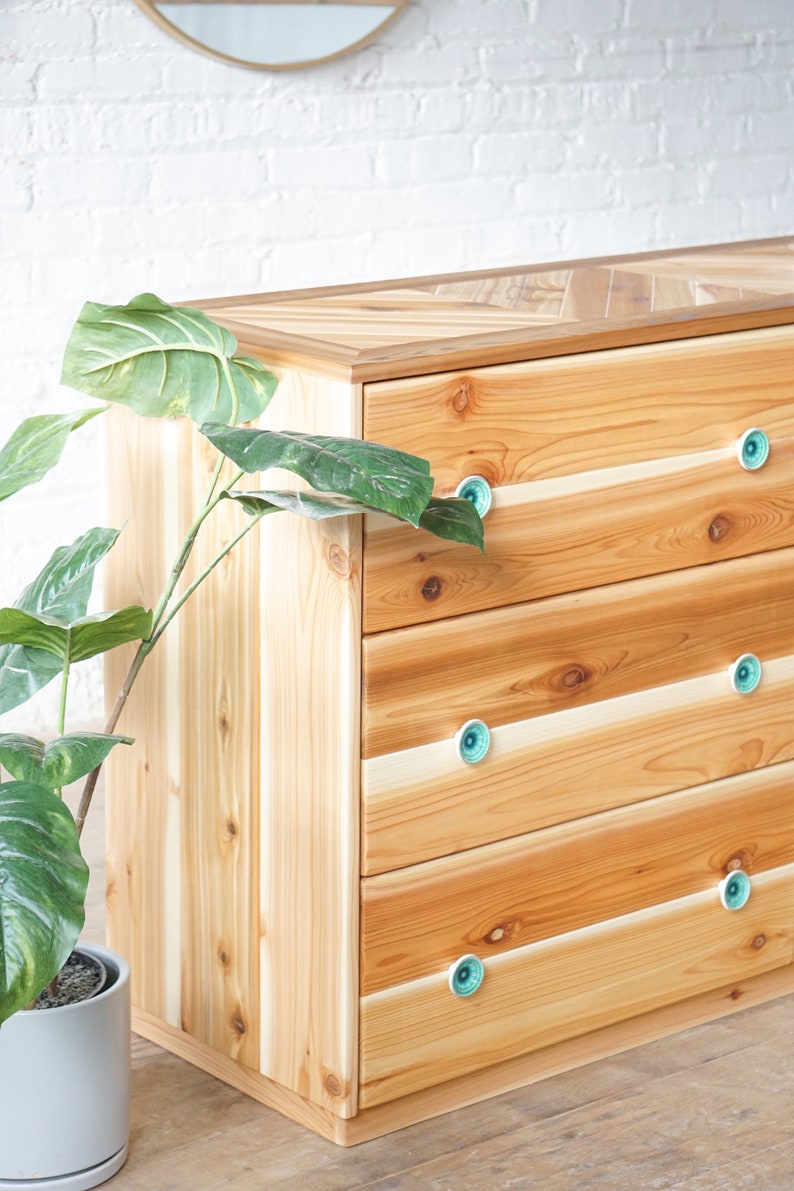 Natural solid wood dresser or storage chest. Furniture for home storage. Chevron pattern detailing. Solid wood drawers. Handcrafted in the USA. Heirloom quality. Sustainably sourced. Bedroom.