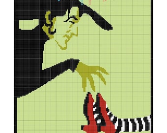 May include: Pixelated illustration of the Wicked Witch of the West from The Wizard of Oz, reaching for the ruby slippers. The image features a black witch silhouette, green skin, and red shoes with black and white striped socks. Text reads "Sew Lovely by Chelsea".