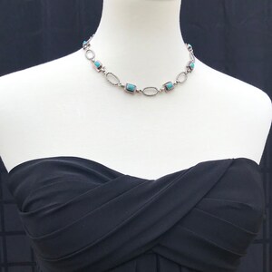 Spectacular genuine turquoise and sterling silver handcrafted adjustable necklace.