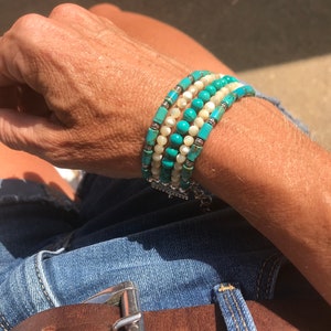 Awesome genuine turquoise and mother of pearl multi strand sterling silver bracelet