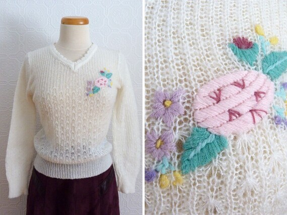 Embroidered woolen knitwear