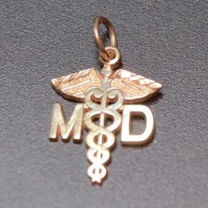 Vintage 14 karat yellow gold caduceus charm pendant md doctore medicine medical nursing nurse