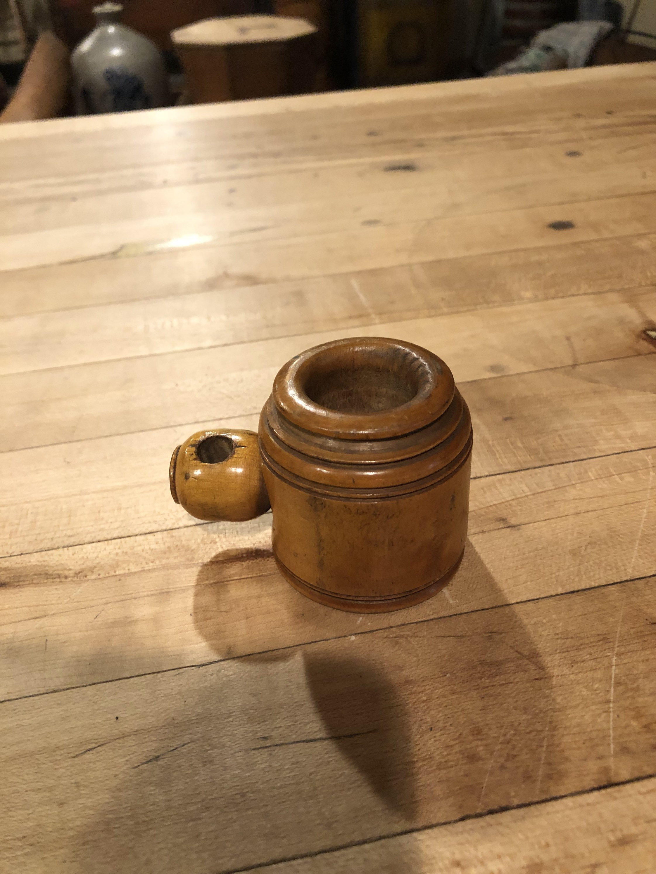 wooden nutmeg grinder