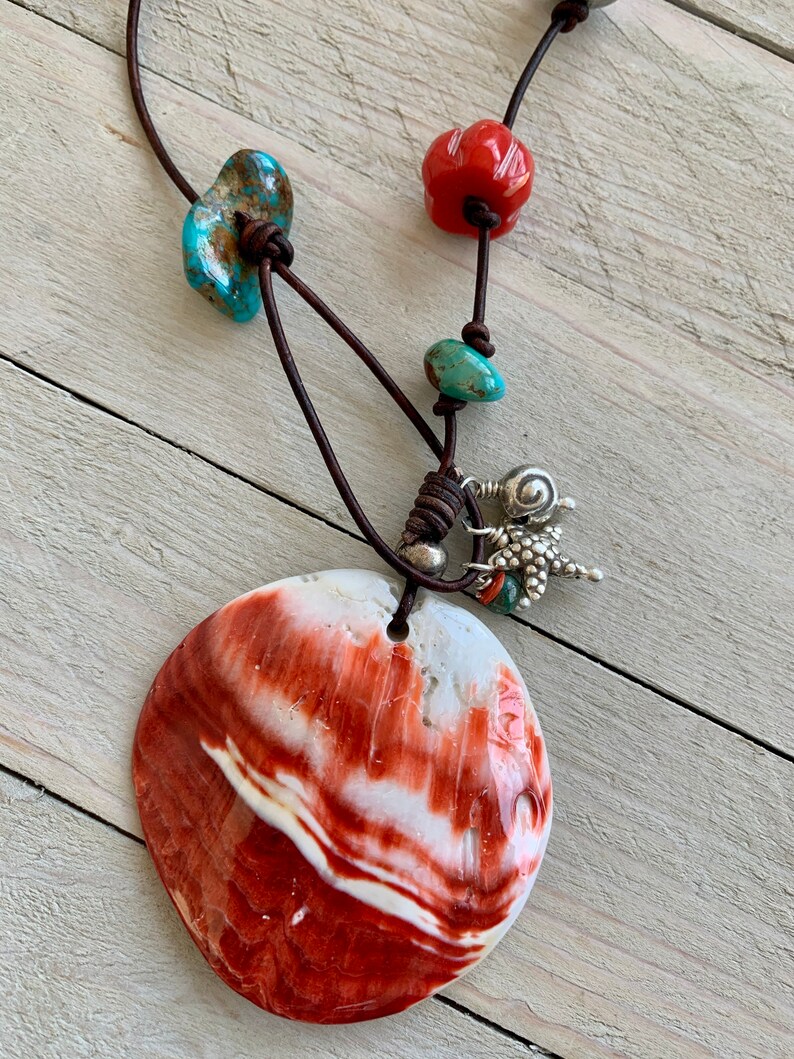LadeDAH! pearls Large spiny oyster pendant hand knotted on to leather cord with turquoise bone coral and Ethiopian silver wood Cortez