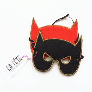 Two-faced superhero mask raving red