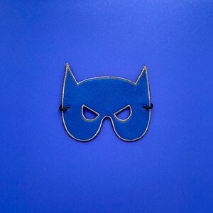 Two-faced superhero mask bold blue