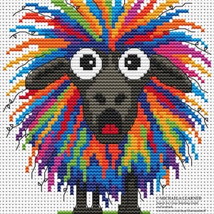 May include: A cross-stitch design of a sheep with a black face and legs, and a vibrant, rainbow-colored wool. The sheep has large, wide eyes and an open mouth, giving it a surprised expression. The design is on a white background.