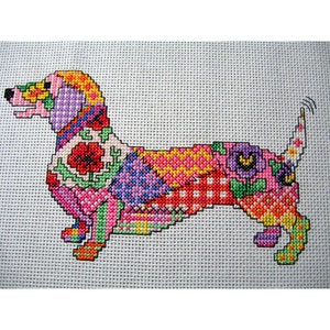 May include: A colorful cross-stitch pattern of a dachshund dog with a patchwork design. The dog is pink, yellow, green, red, blue, and purple.