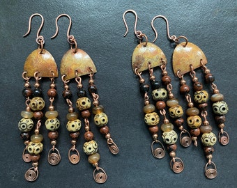 fire patina copper extra long dangle beaded earrings with spiral accents.