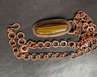 tiger eye and copper pendant with chain.