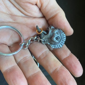 primitive pewter punk keychain.