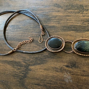 blue tiger eye 2 part pendant in brutalist minimalist copper setting.