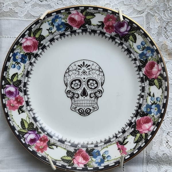 Mini vintage floral saucer with day of the dead skull decal and hanger.