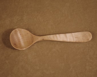 Adult Eating Spoon in Curly Maple