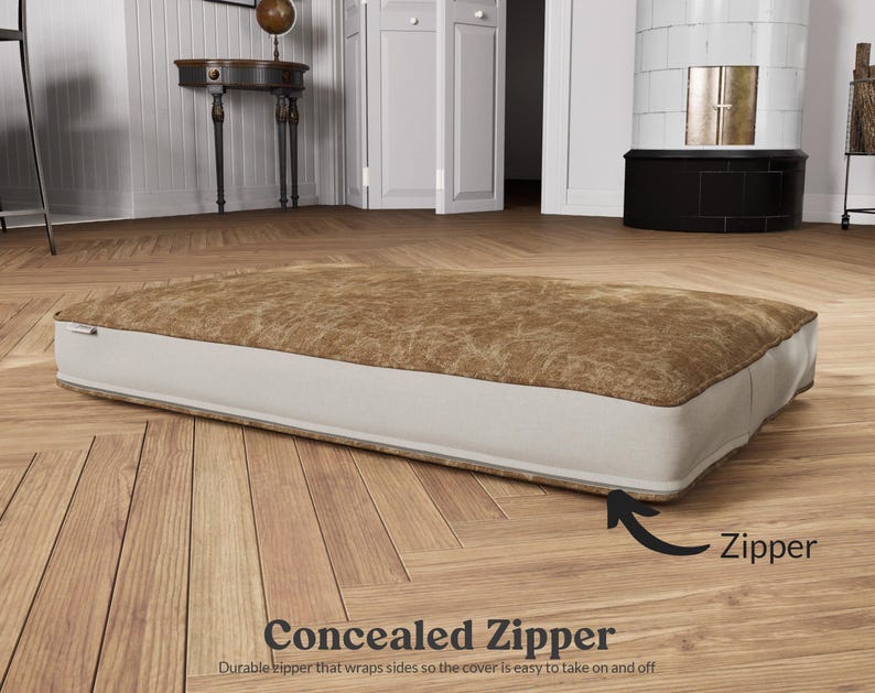 concealed zipper along the back that wraps sides so it's easy to take on and off as needed for washing.