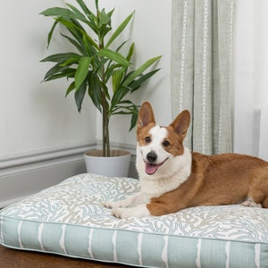 coastal dog bed with spa blue fabrics. fiberfill insert