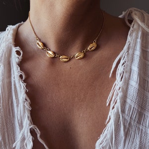 Gold shell necklace,gold cowrie necklace,gold sea shell,hawaiian shell necklace,gold pula shell necklace,layering necklace,mermaid pendant