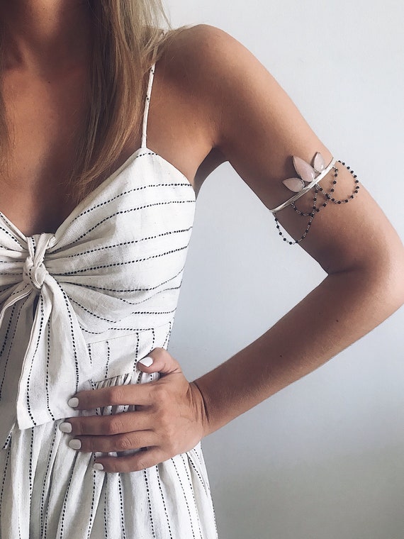 Silver shop arm bands