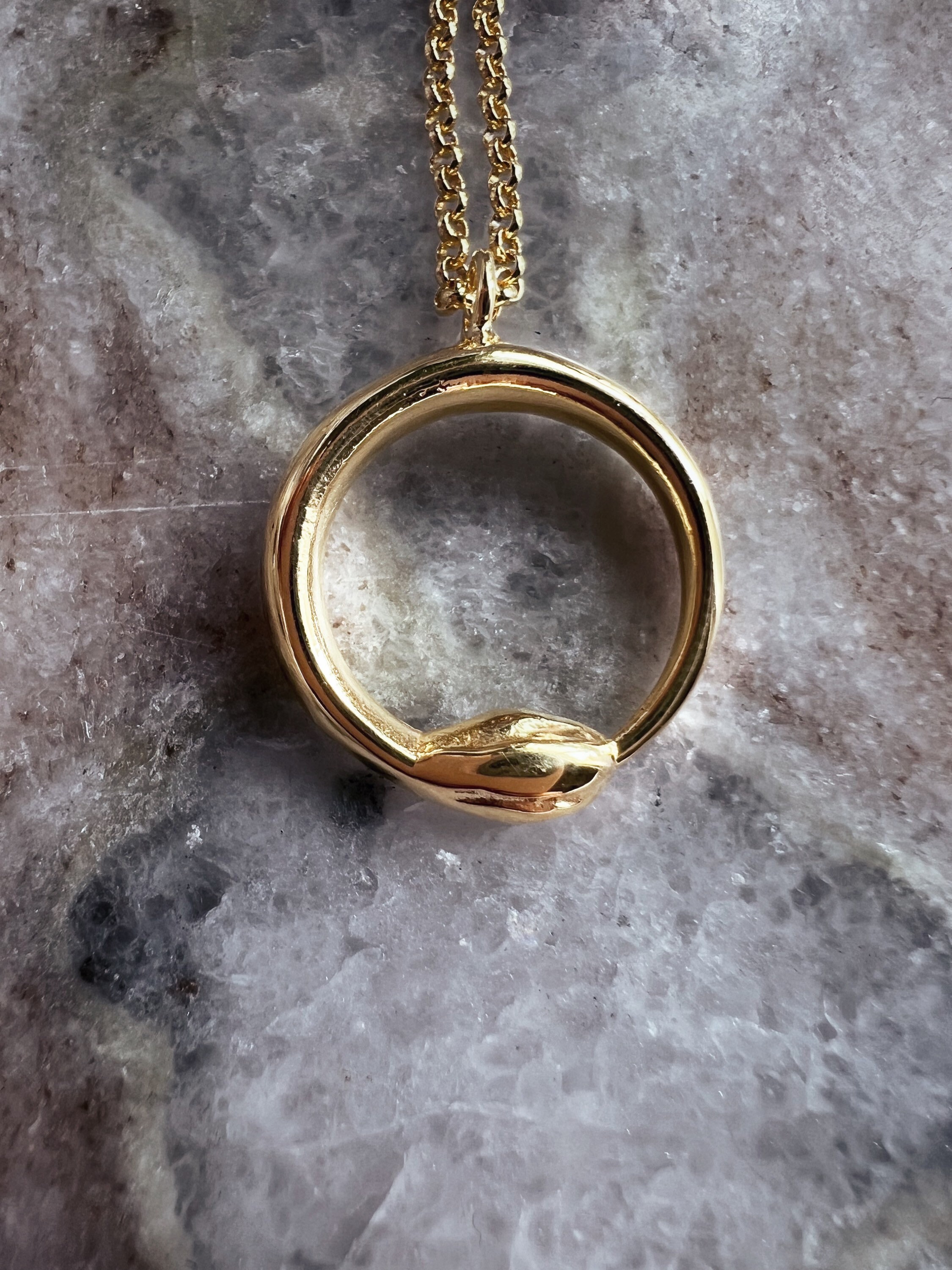 Snake pendant meaning deals