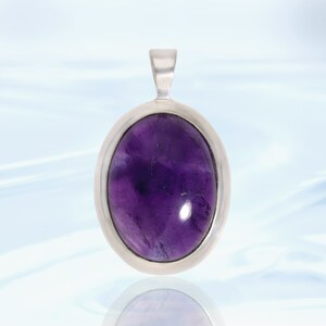 Polished Amethyst Crystal Pendant
